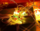 LumiWeih LED Weihnachts-Lichterkette mit Schneemann, Tannenbaum & Weihnachtsmann